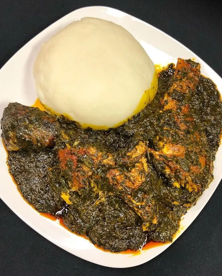 Afang soup with a mould of pounded yam