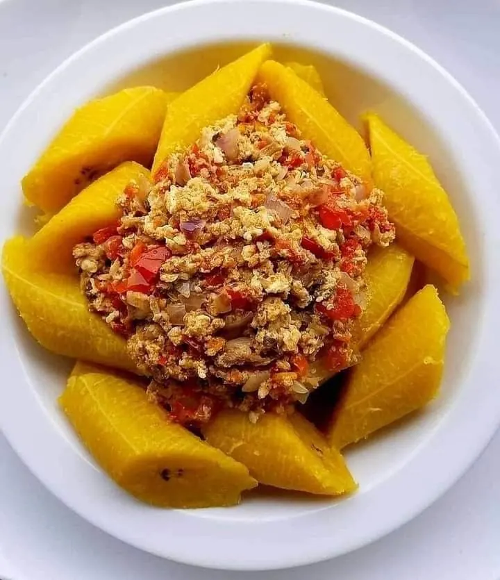 Asaro yam porridge topped with peppered sauce