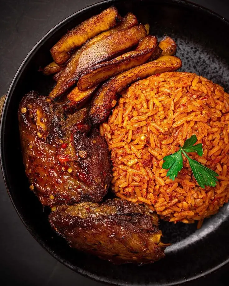 Jollof rice with fried plantain and turkey