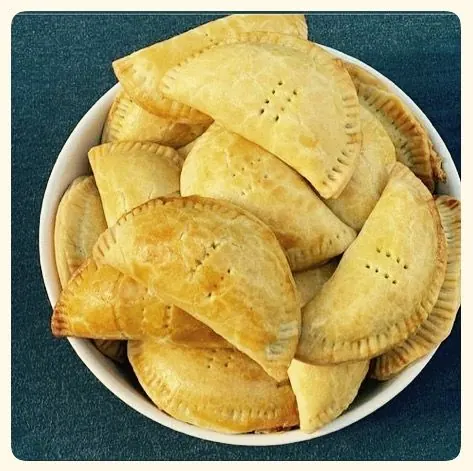 A bowl of golden Nigerian meat pies